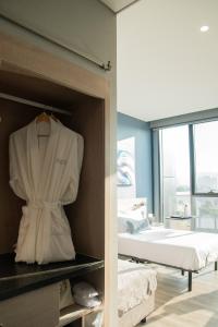 Postel nebo postele na pokoji v ubytování QUARTZ HOTEL & SPA