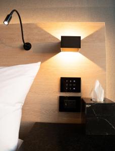 Postel nebo postele na pokoji v ubytování QUARTZ HOTEL & SPA