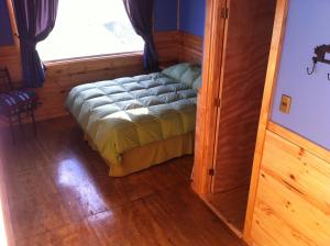 
Кровать или кровати в номере Vista al Paine - Refugio de Aventura
