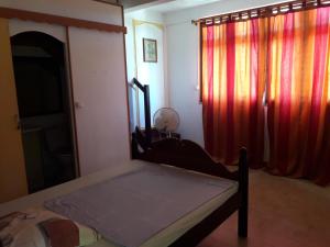 Letto o letti in una camera di La Mirabelle