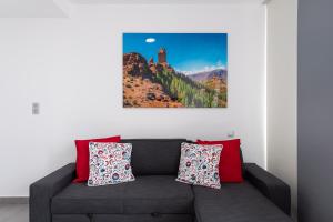A seating area at APARTAMENTOS BLUE EYES