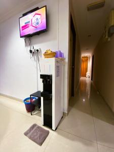 TV a/nebo společenská místnost v ubytování SMART HOTEL SEKSYEN 15 SHAH ALAM