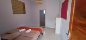 Postel nebo postele na pokoji v ubytování Elisa Homestay Areguling