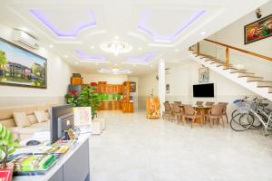 TV a/nebo společenská místnost v ubytování Legend Connect Homestay