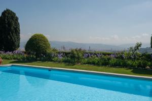 Bazén v ubytování Hotel Torre di Bellosguardo nebo v jeho okolí