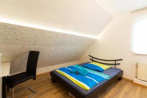 Ein Bett oder Betten in einem Zimmer der Unterkunft Deutsche Messe Zimmer - Private Rooms Hannover Exhibition Center (room agency)