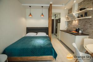 Katil atau katil-katil dalam bilik di Orange Sky Apartments Beach Tower