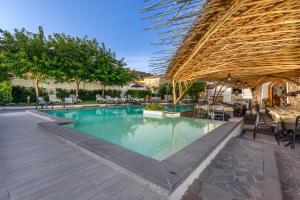 Bazén v ubytování Il Giardino Degli Aranci nebo v jeho okolí