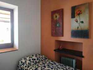 A bed or beds in a room at Villetta Punta Granata Santa Marina Salina