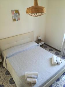 Postel nebo postele na pokoji v ubytování In vacanza a Itri - Casa Ileana