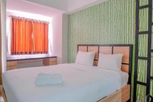Φωτογραφία από το άλμπουμ του Japanese Style Studio Apartment at The Oasis Cikarang By Travelio σε Cikarang