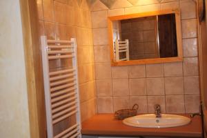 Koupelna v ubytování Chambres d'hôtes l'Abondance
