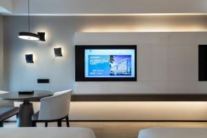 TV a/nebo společenská místnost v ubytování Tian Yi International Hotel 天艺国际酒店