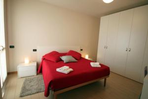 Posteľ alebo postele v izbe v ubytovaní Oleandro Garden 1 - Menaggio by LoveComo + 11 fotografií