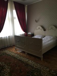 Postelja oz. postelje v sobi nastanitve Guest House Anna Caffe