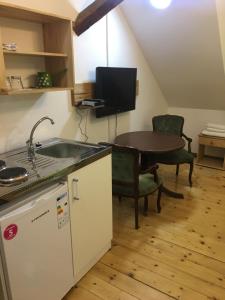 Kuhinja oz. manjša kuhinja v nastanitvi Guest House Anna Caffe