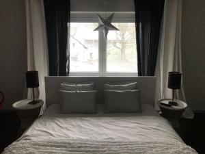 Postel nebo postele na pokoji v ubytování Apartments Centrum