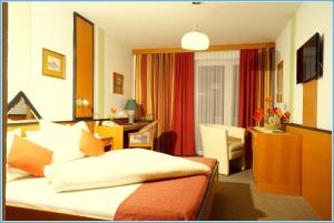 TV o dispositivi per l'intrattenimento presso All Inclusive Hotel Sonnenhügel