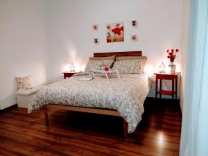 Postel nebo postele na pokoji v ubytování Anamonì Bed and Relax