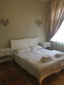 Postelja oz. postelje v sobi nastanitve Guest House Anna Caffe