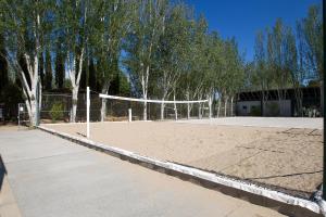 a volley ball court with a volley ball net at Tamarit Beach Resort in Tamarit