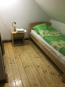 Postelja oz. postelje v sobi nastanitve Guest House Anna Caffe