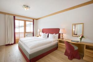 Posteľ alebo postele v izbe v ubytovaní Hotel Angela