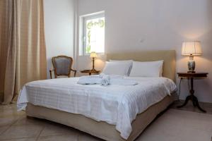 Posteľ alebo postele v izbe v ubytovaní API Projects Nafplio - Family Superior Apartment