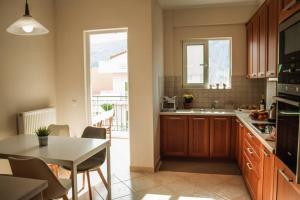 Kuchyňa alebo kuchynka v ubytovaní API Projects Nafplio - Family Superior Apartment