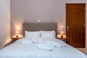 Posteľ alebo postele v izbe v ubytovaní API Projects Nafplio - Family Superior Apartment