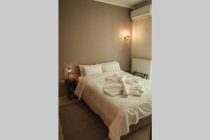 Posteľ alebo postele v izbe v ubytovaní API Projects Nafplio - Family Superior Apartment