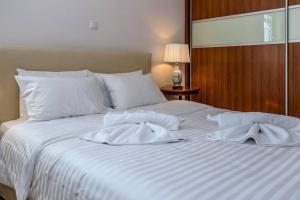 Posteľ alebo postele v izbe v ubytovaní API Projects Nafplio - Family Superior Apartment