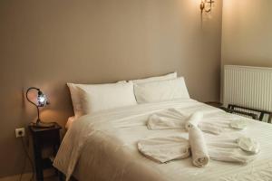 Posteľ alebo postele v izbe v ubytovaní API Projects Nafplio - Family Superior Apartment