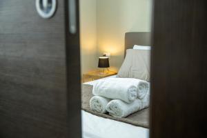 A bed or beds in a room at House Orlando