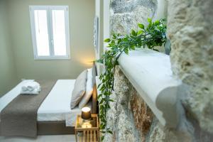 A bed or beds in a room at House Orlando