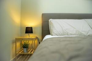 A bed or beds in a room at House Orlando
