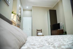 A bed or beds in a room at House Orlando