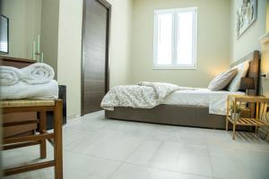 A bed or beds in a room at House Orlando