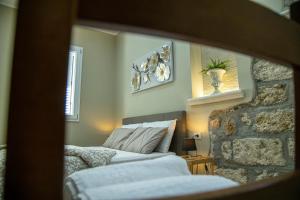 A bed or beds in a room at House Orlando