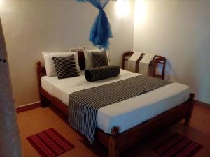 Letto o letti in una camera di Hotel Samanala Sigiriya