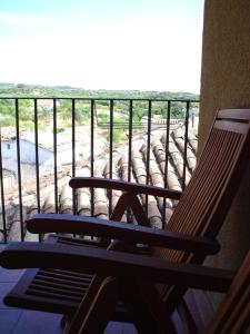 Un balcón o terraza de Casa Plana