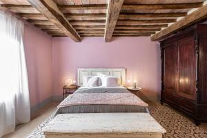 Łóżko lub łóżka w pokoju w obiekcie B&B Gli Archi