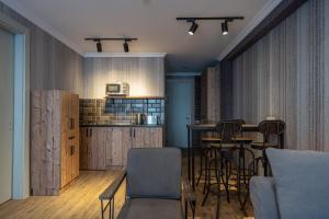 Η κουζίνα ή μικρή κουζίνα στο Alpine Valley - New Gudauri +23 φωτογραφίες