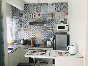 A cozinha ou cozinha compacta de Studio- Grand Bay- 30 Meters from the Beach