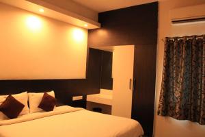 Ein Bett oder Betten in einem Zimmer der Unterkunft Temple Stays - Friendliness & Cleanliness Room