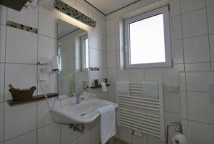 Koupelna v ubytování Dünenhotel Borkum