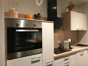 Kuchyň nebo kuchyňský kout v ubytování Posthof Apart . Zimmer + 27 fotografií