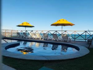 Bazén v ubytování Pousada Maria Bonita Porto De Galinhas nebo v jeho okolí