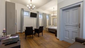 Posteľ alebo postele v izbe v ubytovaní Wellness & Spa hotel Villa Regenhart