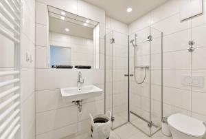 Ein Badezimmer in der Unterkunft Hotel- & Ferienanlage Kapitäns-Häuser Breege